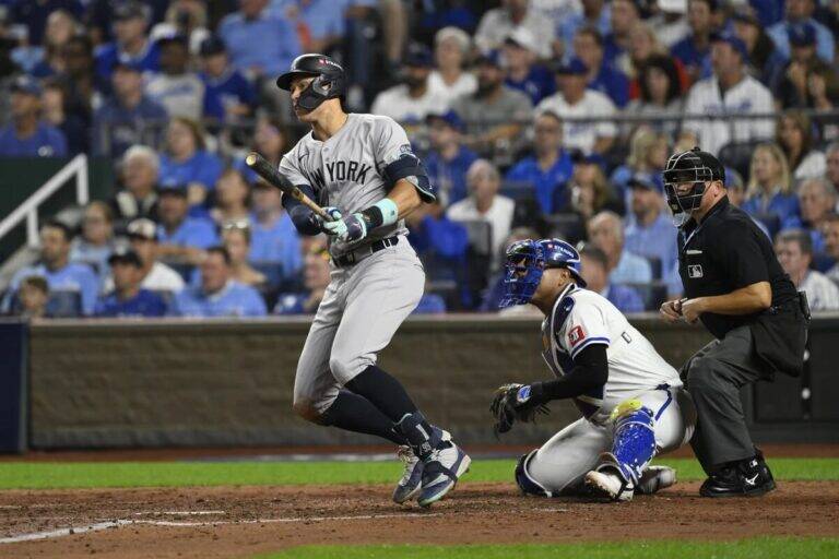 New York Yankees’ Aaron Judge doubles during the sixth inning in Game 4 of an American League Division baseball playoff series against the Kansas City Royals Thursday, Oct. 10, 2024, in Kansas City, Mo.